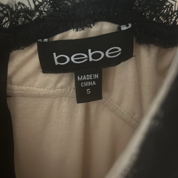 Bebe size small Lacey black tight dress. Zipper works. Never been worn! - Picture 5 of 5